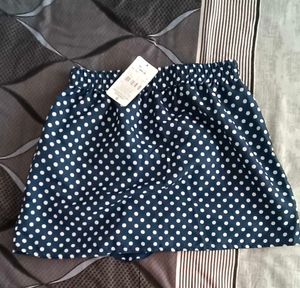 Polka Dot Mini Skirt with Ruffle Detail