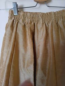 Elegant Gold coloured skirt