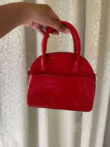 glossy red mini handbag