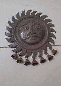 antique sun face decorative wall hanging with bell