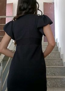 Chic Black Checkerboard Cutout Dress