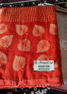 Elegant Orange Saree with Leaf Print
