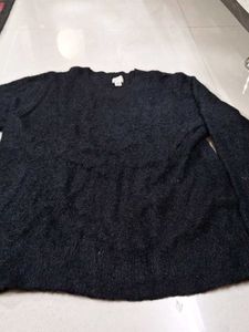 Black shiny woolen top