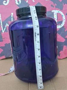 Large Empty Blue Protein Container
