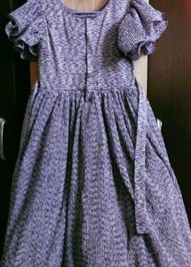 Elegant Purple Pleated Gown with Embellished Belt