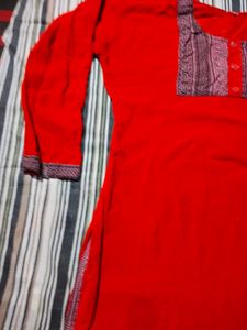 Vibrant Red Kurta with Intricate Neckline