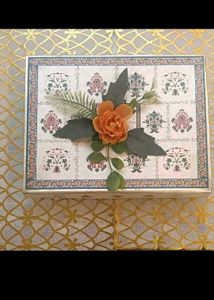 13. Decorative Gift Box with Floral Accent