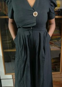 Chic Black Puff Sleeve Wrap jumpsuit.