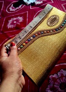 Elegant Gold Embellished Clutch Bag