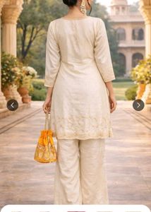 New Elegant Cream Kurta Set with Orange Accents