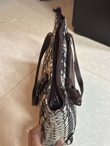 Chic Brown Handbag with Unique Pattern