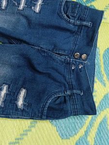Ripped Blue Denim Jeans