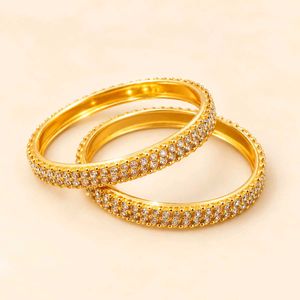 Elegant Gold Bangles with Crystals