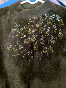 Imported women's fuzzy knit sweater with a high ne