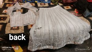 Stunning Sequined Grey Lehenga choli with dupatta.