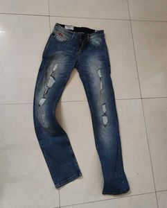 Distressed Blue Denim Jeans