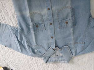 Light Wash Denim one piece with open buttons