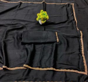 Elegant Black Saree with Gold Trim
