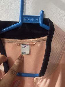 Reebok light orange gym wear Jacket