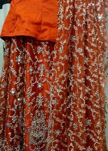 Stunning Orange Embroidered Bridal Lehenga