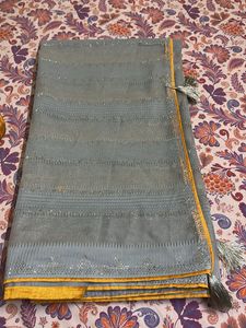 Elegant grye Saree with Mustard Blouse