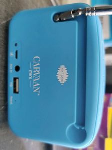 Saregama Carvaan Mini Legends in red, blue green