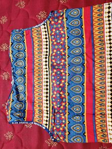 INDIDORI Brand, Multi Coloured Kurti With Beautiful 'chumki' Design On The Neck And Bottom Part.