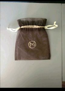 malabar gold n diamonds drawstring potli with logo