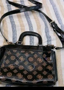 Guess Monogram Sling Bag