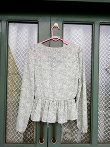 Chic Printed Peplum Blouse with Tie Neck