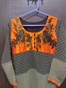 New Orange 🍊 Embroidery Kurti for ladies