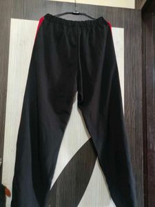 Stylish Wide-Leg Pants with Red Stripes