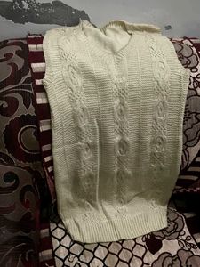 12. Cream Cable Knit Sleeveless Sweater Vest