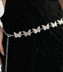 jeans with butterfly chain belt