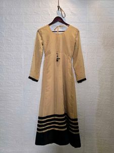 Elegant Beige Anarkali Gown