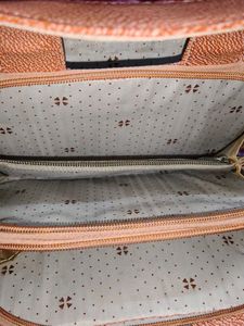 Chic Rose Gold Clutch with Pearl Accent