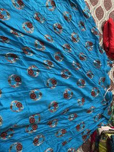 Vibrant Red Ethnic blouse and sky color chaniya