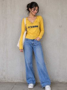 Yellow Long Sleeve Top with "Levi's Jeans" Graphic