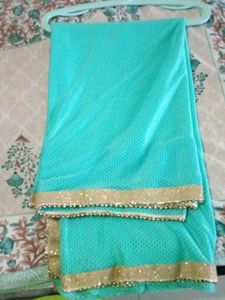 Beautiful Turquoise Saree with Gold Border