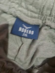 grey baggy nobero sweats with green lining
