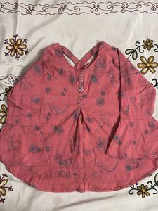 Peach peplum top