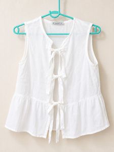 White Sleeveless Peplum Top with Bows