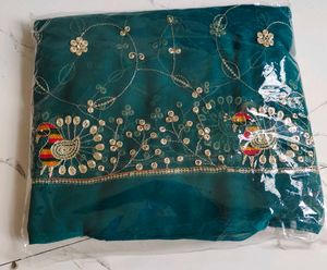 Exquisite Teal Peacock Embroidered Saree