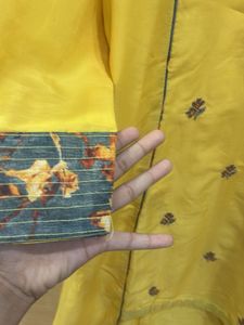 Yellow Embroidered kurta with skirt