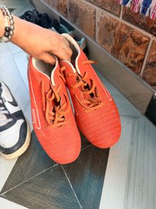 Vibrant Orange Soccer Cleats