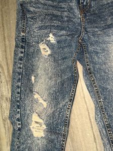 Distressed Blue Denim Jeans