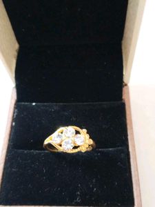 Elegant Gold Ring with Clear Stones