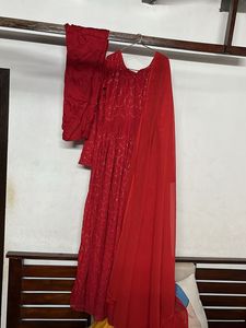 Vibrant Red gown with Intricate Work
