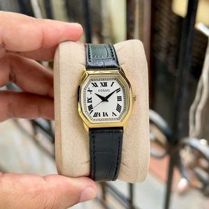 Fossil Gold Tone Watch with Black Leather Strap