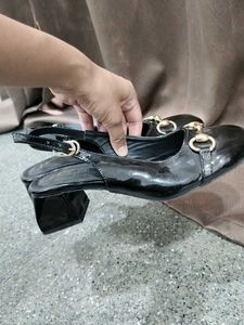 Chic Black Patent Heels with Gold Buckle